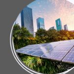 A city skyline with solar panels in the foreground